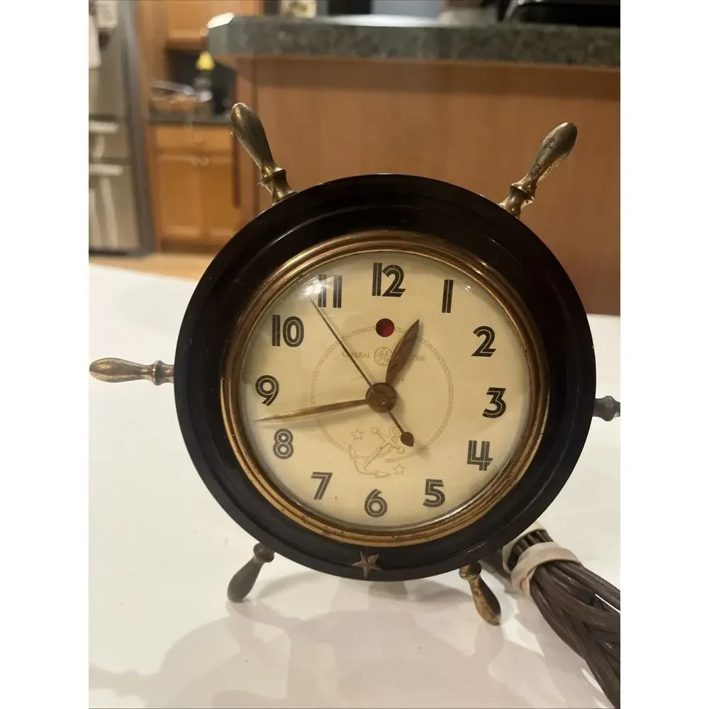 Vintage General Electric Tabletop Clock Brass Ship Wheel Clock Model #3H98 WORKS